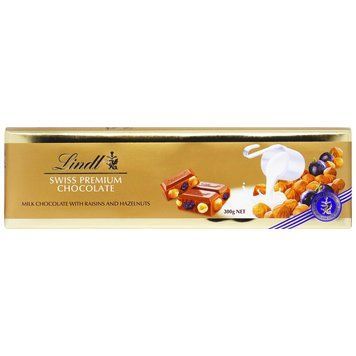 Шоколад Lindt Swiss Premium 225г мол. з родзинками та фундуком 00-00008936 фото
